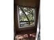 Balcony overlooking a lush, tree-lined landscape at 4400 Thornbriar Ln # A202, Orlando, FL 32822