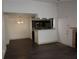 Kitchen with dark cabinets and stainless steel appliances at 4400 Thornbriar Ln # A202, Orlando, FL 32822