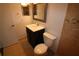 Updated bathroom with a vanity, toilet, and tiled shower/tub combo at 4400 Thornbriar Ln # A202, Orlando, FL 32822