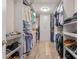 Large walk-in closet with ample shelving and hanging space at 16328 Wind View Ln, Winter Garden, FL 34787