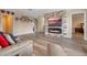 Cozy living room with a modern fireplace and built-in entertainment center at 16328 Wind View Ln, Winter Garden, FL 34787