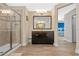 Bathroom with walk-in shower, double vanity, and soaking tub at 16328 Wind View Ln, Winter Garden, FL 34787
