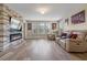 Gathering room with a modern fireplace and comfortable seating at 16328 Wind View Ln, Winter Garden, FL 34787
