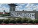 Waterleigh community entrance with fountain and signage at 16328 Wind View Ln, Winter Garden, FL 34787