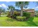 Landscaped backyard with lush greenery and a pool at 16328 Wind View Ln, Winter Garden, FL 34787