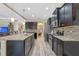 Spacious kitchen with an island, stainless steel appliances, and ample counter space at 16328 Wind View Ln, Winter Garden, FL 34787