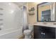 Well-appointed bathroom with shower/tub combo and modern vanity at 16328 Wind View Ln, Winter Garden, FL 34787