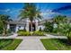 Community center with palm trees and landscaping at 16328 Wind View Ln, Winter Garden, FL 34787