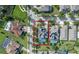 Aerial view of a house with a pool in a residential neighborhood at 16328 Wind View Ln, Winter Garden, FL 34787