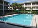 Refreshing community pool with ample deck space for lounging at 103 Oyster Bay Cir # 120, Altamonte Springs, FL 32701