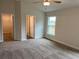 Spacious main bedroom with ample closet space and ensuite bathroom at 4306 Sagefield Dr, Harmony, FL 34773