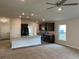Open kitchen features an island, dark cabinets, and stainless steel appliances at 4306 Sagefield Dr, Harmony, FL 34773