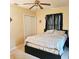 Spacious bedroom with a large bed and ceiling fan at 1250 Saint James Rd, Orlando, FL 32808