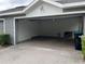 Empty garage with overhead door open at 14460 Clarkson Dr, Orlando, FL 32828