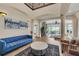 Open living area with high ceilings and access to the backyard at 364 Muirfield Loop, Reunion, FL 34747