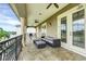 Spacious balcony with patio furniture, offering scenic views at 364 Muirfield Loop, Reunion, FL 34747