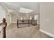 Open upper hallway with skylight and views to lower level at 364 Muirfield Loop, Reunion, FL 34747