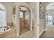 Bathroom features a large shower with glass enclosure and soaking tub at 364 Muirfield Loop, Reunion, FL 34747