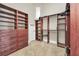 Large walk-in closet with ample shelving and drawers at 364 Muirfield Loop, Reunion, FL 34747