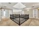 Upper hallway with a skylight, and an open staircase at 364 Muirfield Loop, Reunion, FL 34747