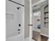 Clean bathroom with a shower/tub combo and modern fixtures at 1409 Sutton Island Dr, Deland, FL 32724