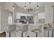 Modern kitchen with stainless steel appliances and breakfast bar at 1409 Sutton Island Dr, Deland, FL 32724
