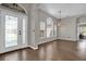 Elegant entryway with hardwood floors and stained glass door at 1409 Sutton Island Dr, Deland, FL 32724