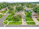 Aerial view of house, highlighting its location in a residential neighborhood at 1409 Sutton Island Dr, Deland, FL 32724