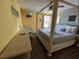 King-size bed, crib, and large TV in this bedroom at 2718 Lido Key Dr, Kissimmee, FL 34747