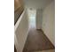 Bright hallway with neutral carpeting at 153 Mandovi St, Davenport, FL 33837