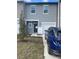 Two-story townhome exterior at 153 Mandovi St, Davenport, FL 33837
