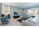 Spacious living room with a large sectional sofa at 7554 Marker Ave, Kissimmee, FL 34747