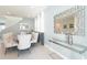 Formal dining room with a modern chandelier at 7554 Marker Ave, Kissimmee, FL 34747