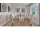 Bright dining room featuring a large wooden table and neutral decor at 3726 Bluethread Way, Poinciana, FL 34759