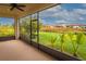 Relaxing screened porch overlooking a lush backyard at 3951 Carrick Bend Dr, Kissimmee, FL 34746