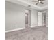 Primary bedroom with carpet and access to bathroom at 3951 Carrick Bend Dr, Kissimmee, FL 34746