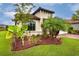 Single story home with red tile roof and manicured landscaping at 3951 Carrick Bend Dr, Kissimmee, FL 34746