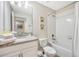 Bathroom with granite countertop and bathtub at 4782 Kings Castle Cir, Kissimmee, FL 34746
