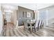 Dining room with six chairs and a gray accent wall at 4782 Kings Castle Cir, Kissimmee, FL 34746