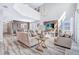 Open concept living area with high ceilings and a view into the dining area at 4782 Kings Castle Cir, Kissimmee, FL 34746