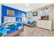 Minion themed bedroom with twin beds and TV at 4782 Kings Castle Cir, Kissimmee, FL 34746