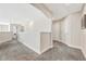 Bright hallway with neutral colors and carpet at 4782 Kings Castle Cir, Kissimmee, FL 34746
