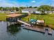 Community dock with kayaks and gazebo at 4782 Kings Castle Cir, Kissimmee, FL 34746