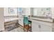 Bathroom with soaking tub, double vanity, and granite countertop at 4782 Kings Castle Cir, Kissimmee, FL 34746