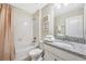 Clean bathroom with granite countertop and bathtub at 4782 Kings Castle Cir, Kissimmee, FL 34746