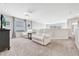 Spacious bonus room with two recliners and a window at 4782 Kings Castle Cir, Kissimmee, FL 34746