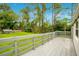 Back deck overlooking a large backyard at 141 Autumn Ct, Saint Cloud, FL 34771