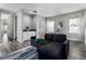Comfortable lounge area with sectional sofa and wet bar at 1407 Fairview Cir, Reunion, FL 34747