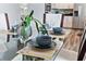 Close-up of a dining table set for a meal with modern place settings at 1407 Fairview Cir, Reunion, FL 34747