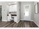 Bright entryway with built-in desk and storage at 1407 Fairview Cir, Reunion, FL 34747